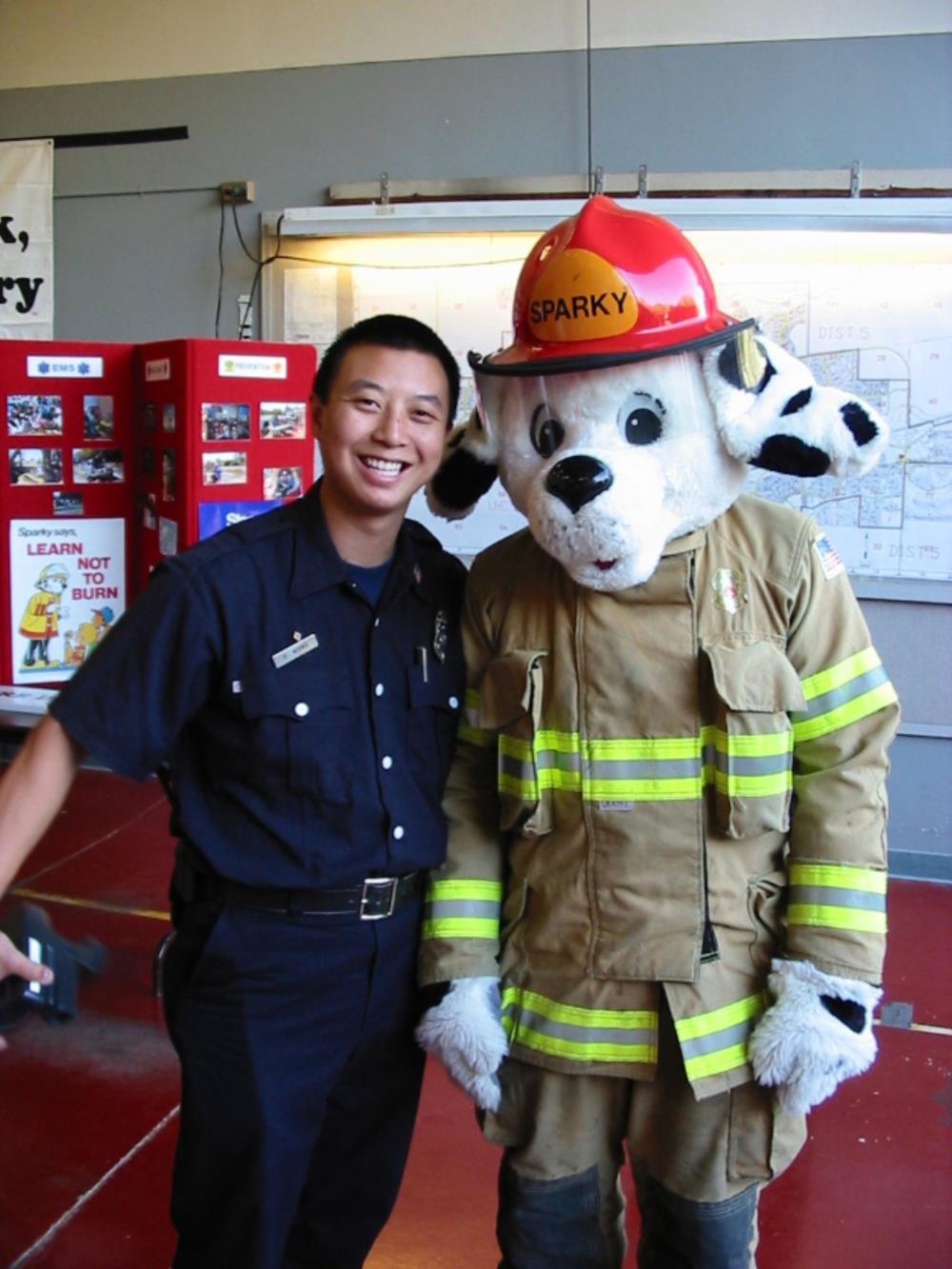 Firefighter with Sparky Mascot