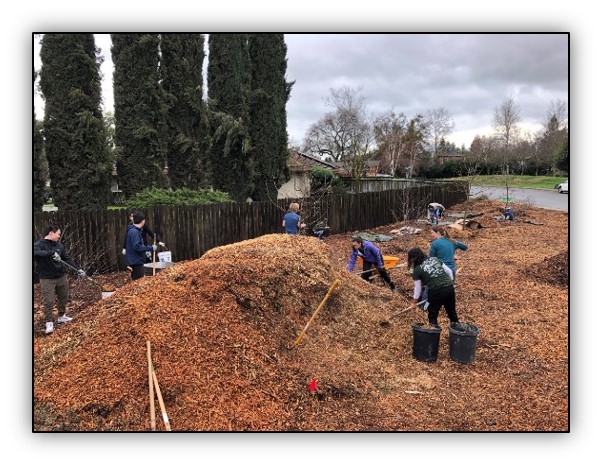 Volunteers Spreading Mulch