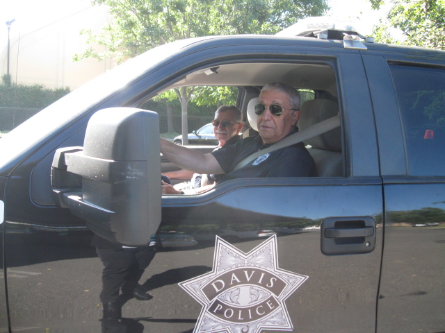 two male volunteers in a truck